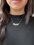 Load image into Gallery viewer, Model wearing Handmade sterling silver nugget necklace with vibrant green apatite stones by Philippa Roberts.
