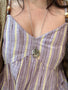 Load image into Gallery viewer, Model wearing Anzie celestial locket necklace on a long sterling silver chain featuring a star cluster design set with white sapphires, bold keepsake statement jewelry piece and handcrafted designer celestial-inspired necklace.
