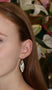 Load image into Gallery viewer, Model wearing handcrafted 14k gold cicada wing earrings by Annette Ferdinandsen with luminous mother of pearl slabs and gold ear wires

