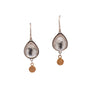 Load image into Gallery viewer, Pair of sterling silver dangling earrings with teardrop-shaped white topaz stones and gold accents by Ananda Khalsa
