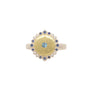 Load image into Gallery viewer, Mixed metal ring with an 18k yellow gold face with a bead set aquamarint at its center surrounded by a bubbly sterling silver frame consisting of bezel set white diamonds and blue sapphires on a sterling silver band by Adel Chefridi. 
