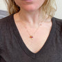 Load image into Gallery viewer, Ruby, Carnelian, and Gold Charm Necklace
