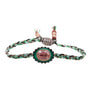 Load image into Gallery viewer, Pink tourmaline and metallic green enamel  bracelet on braided green and black multi cord with magnetic closure.
