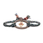 Load image into Gallery viewer, Evil Eye bracelet in 10K yellow gold and sterling silver with braided blue multi cord and magnetic closure, by Patricia Arango.
