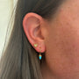 Load image into Gallery viewer, Turquoise Bullet Huggie Hoops

