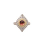 Load image into Gallery viewer, Mixed metal ring made out of a sterling silver band and marquis shaped face, holding a warm pink tourmaline bezel set cabachon surrounded by bezel set white diamonds in 18k yellow gold, by Adel Chefridi. 
