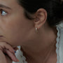 Load image into Gallery viewer, Tapered Baguette Diamond Curved Screw Back Stud Earrings
