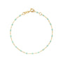 Load image into Gallery viewer, 18k yellow gold 7.5" cable chain bracelet with jade colored resin beads by Gigi Clozeau. 
