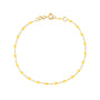 Load image into Gallery viewer, 18k yellow gold 7.5" cable chain bracelet with lemon colored resin beads by Gigi Clozeau. 
