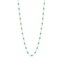 Load image into Gallery viewer, 18k yellow gold 17.7" chain with turquoise colored resin beads by Gigi Clozeau. 
