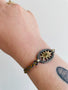 Load image into Gallery viewer, Gold Sun Bracelet + Grey Yellow Multi Braided Cord
