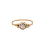 Load image into Gallery viewer, An Ananda Khalsa ring with a central  hexagon shaped rose cut grey diamond bezel set in 18K yellow gold with 3 bezel set white diamonds on either side.
