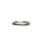 Load image into Gallery viewer, A platinum eternity band with varying sizes of whannel set white diamonds.
